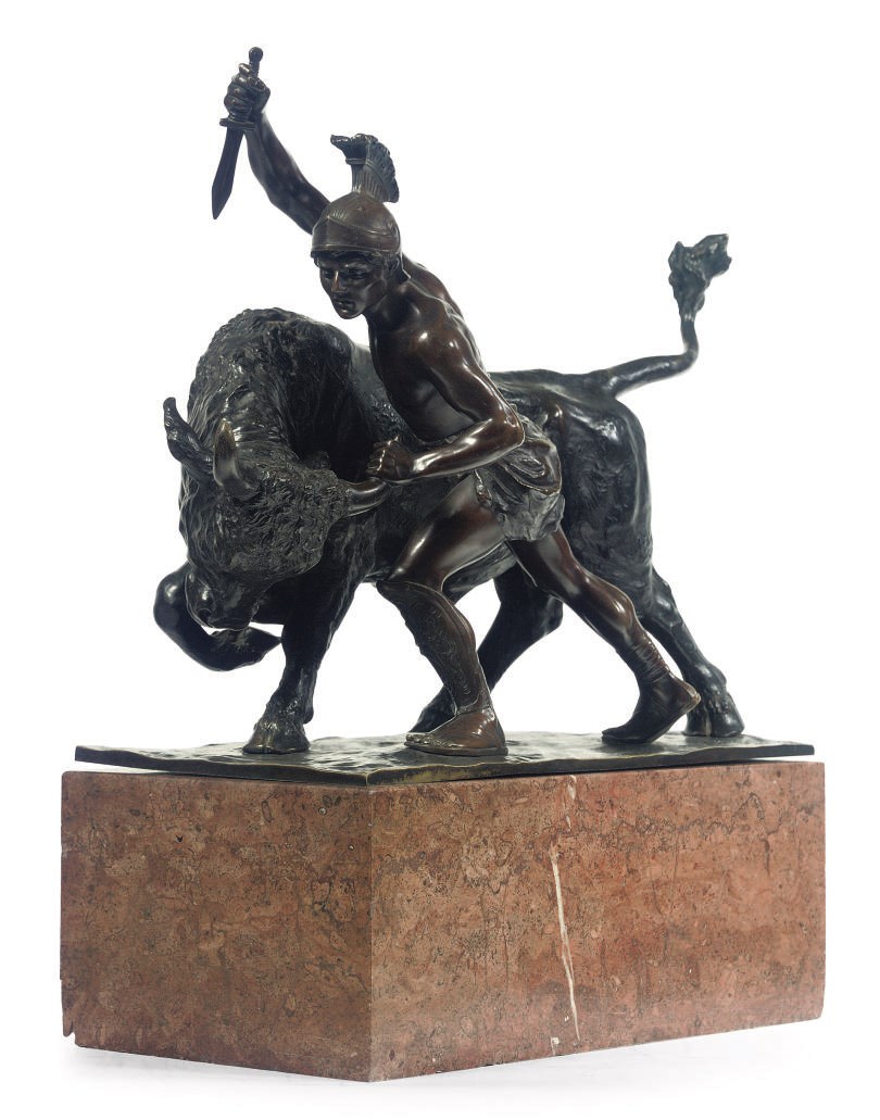 A BRONZE GROUP OF A ROMAN SOLDIER ATTACKING A BULL