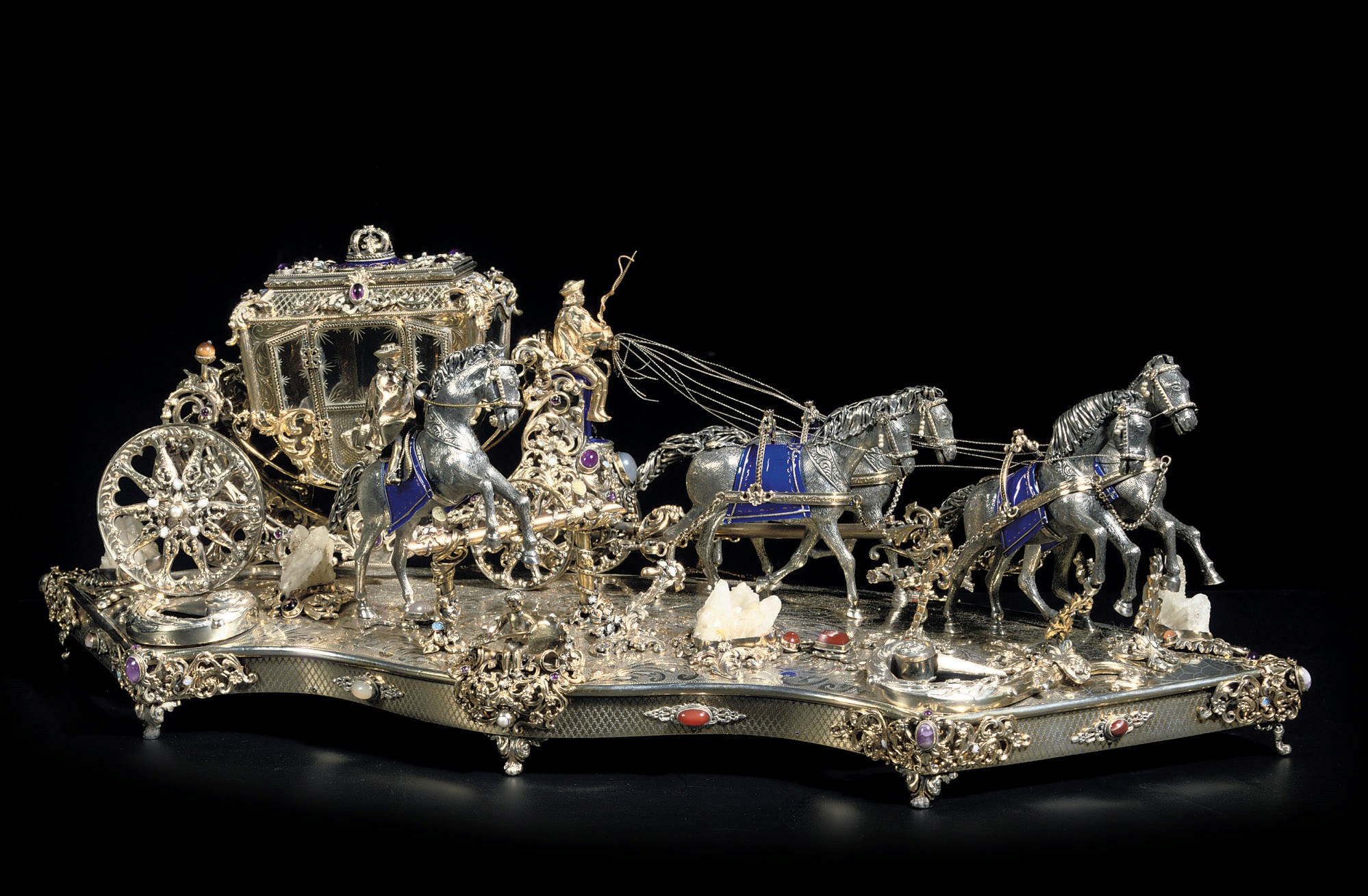 A parcel-gilt silver, enamel and 'gem' set model of a carriage