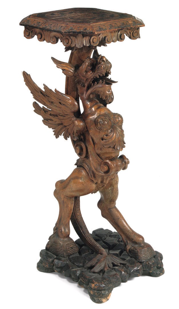 AN ITALIAN STAINED CARVED WOOD GUERIDON