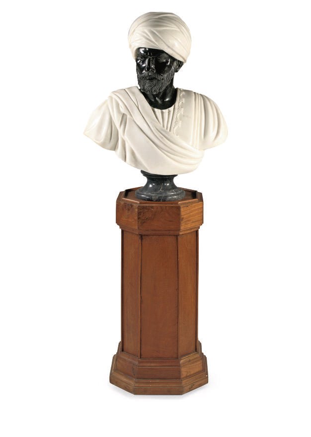 A BLACK AND WHITE MARBLE BUST OF A MAN