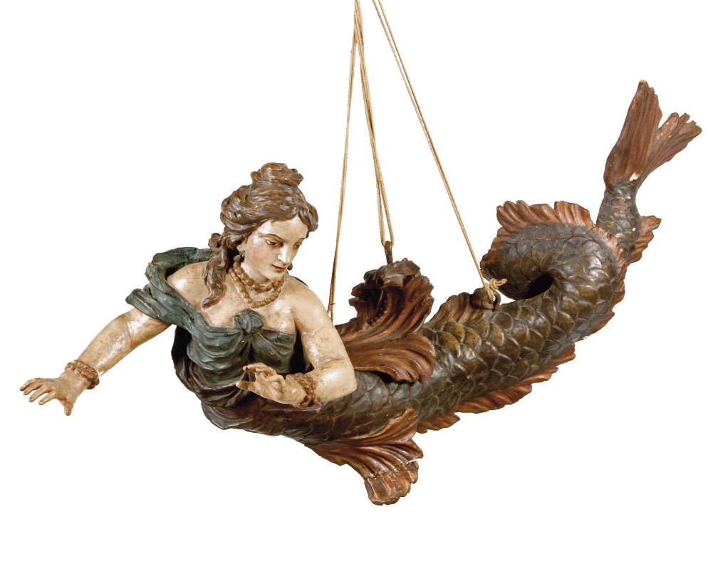 A GERMAN POLYCHROME PAINTED CARVED WOOD "LÜSTERWEIBCHEN"