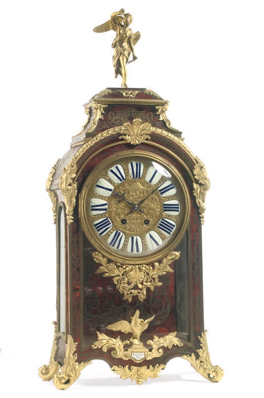 A FRENCH ORMOLU-MOUNTED TORTOISESHELL AND BRASS INLAID BRACKET CLOCK