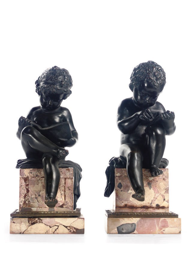 A PAIR OF BRONZE FIGURES OF PUTTI