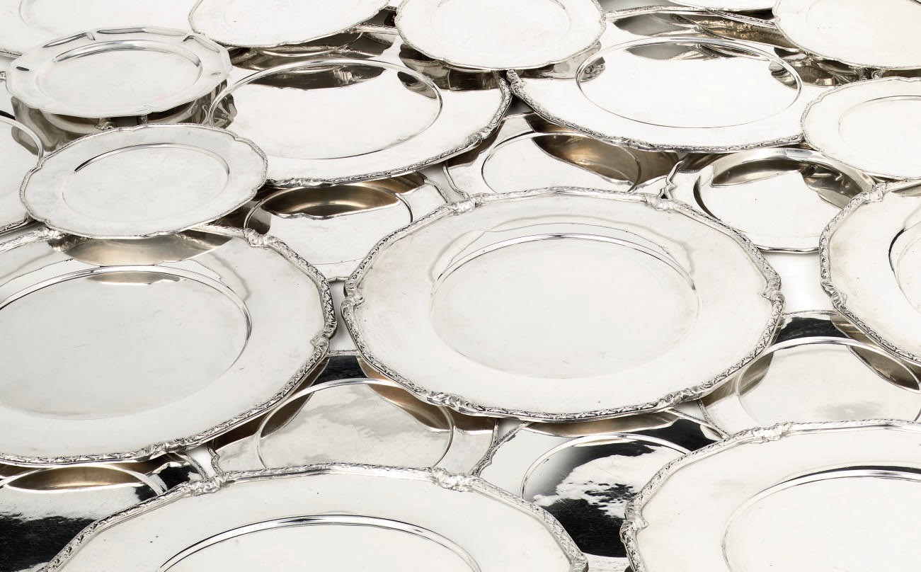 A set of twelve Mexican silver dinner plates, twelve side-plates and three side plates