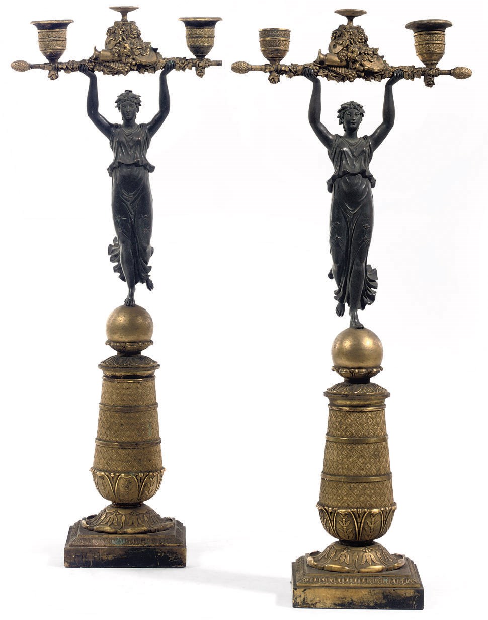 A PAIR OF RESTAURATION ORMOLU AND PATINATED BRONZE TWIN-LIGHT CANDELABRA