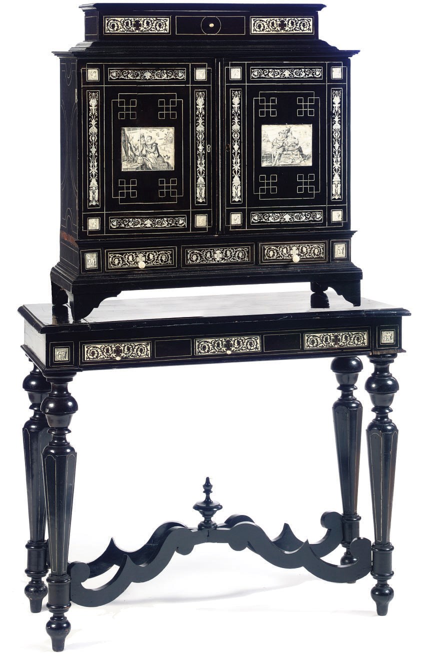 AN ITALIAN EBONY, EBONIZED AND ENGRAVED IVORY CABINET-ON-STAND