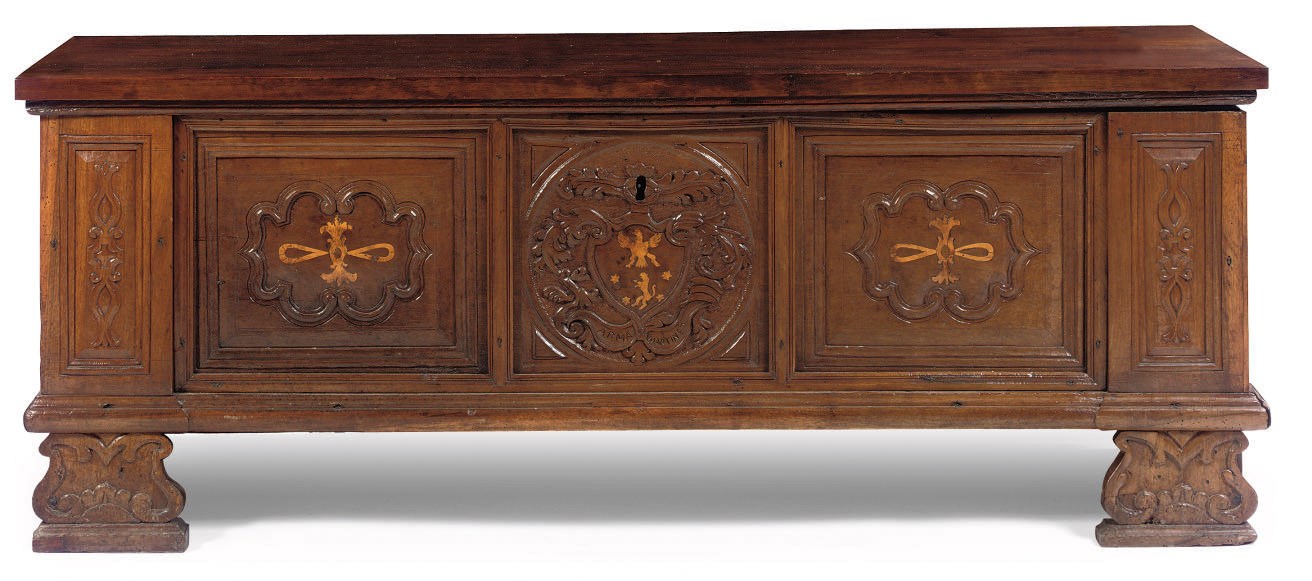 AN ITALIAN WALNUT AND STAINED FRUITWOOD CASSONE