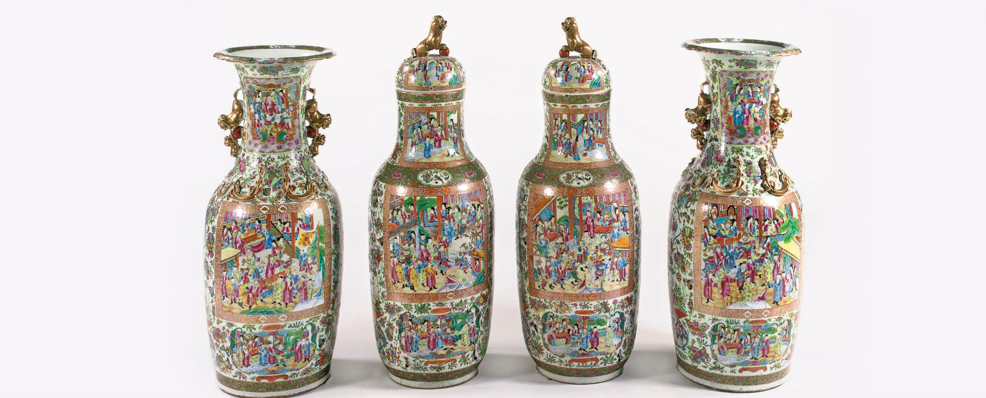 Two pairs of Chinese Canton famille rose vases