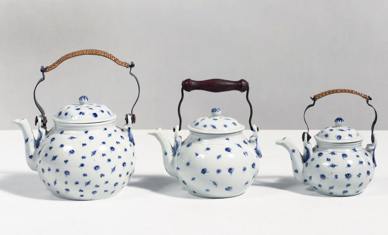 Three Thüringen porcelain blue and white teapots and covers