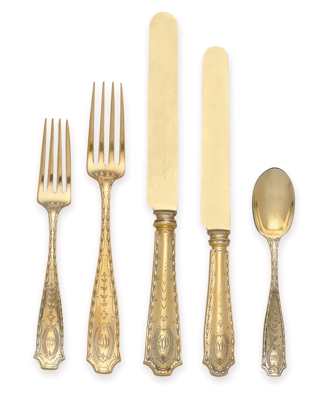 A SILVER-GILT FLATWARE SERVICE