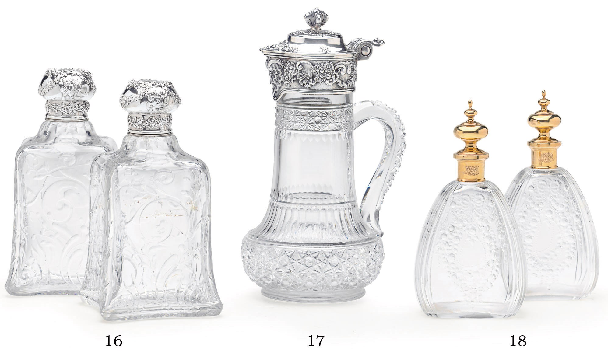 A SILVER-MOUNTED GLASS CLARET JUG