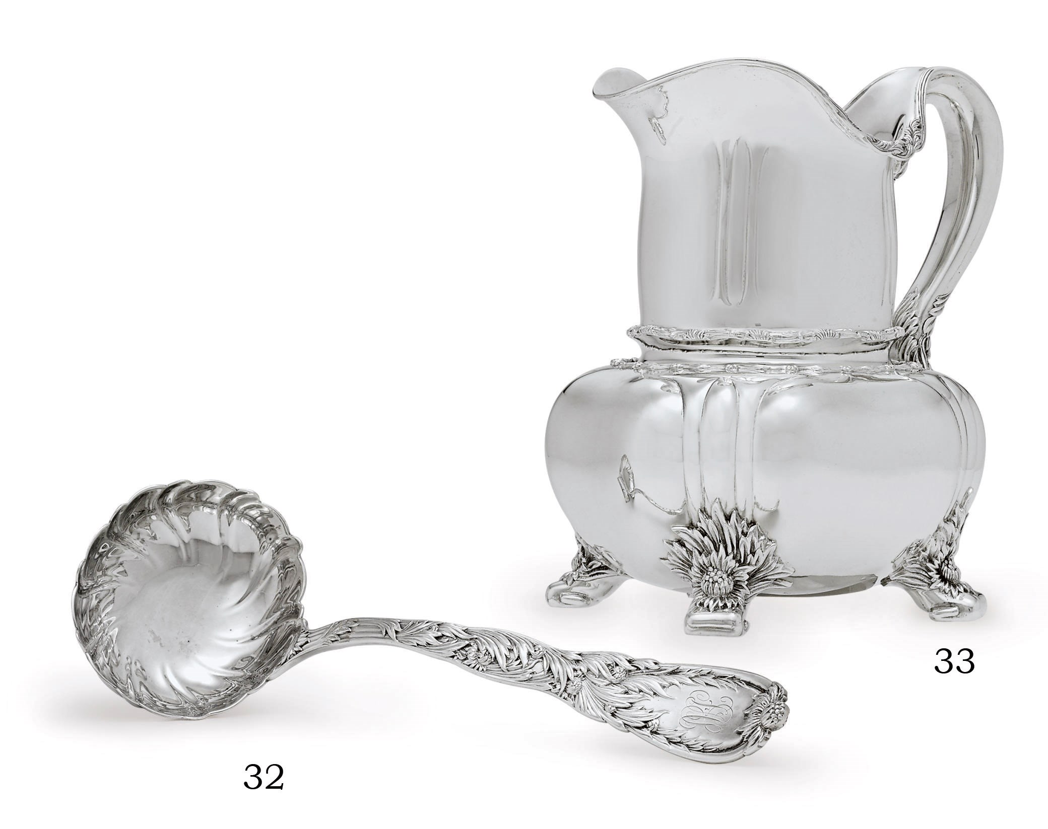 A SILVER WATER PITCHER