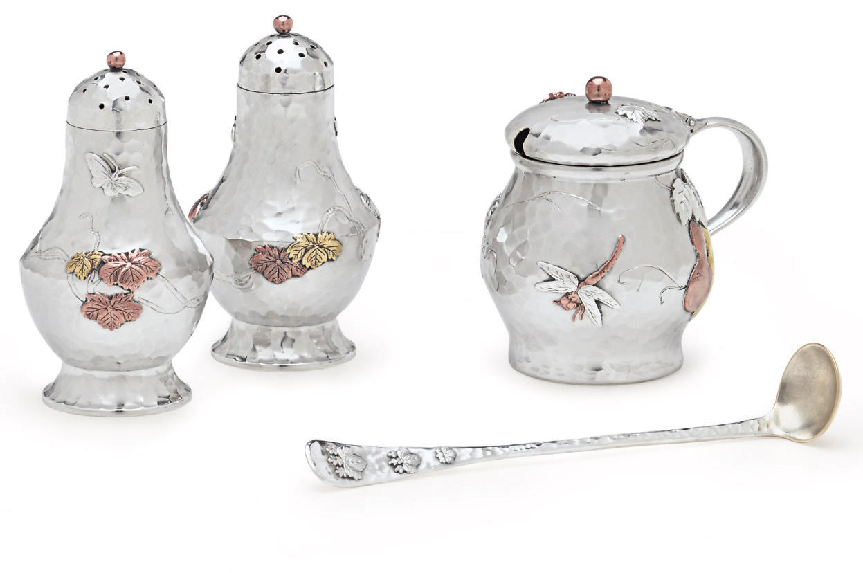 A SILVER AND MIXED-METAL CONDIMENT SET