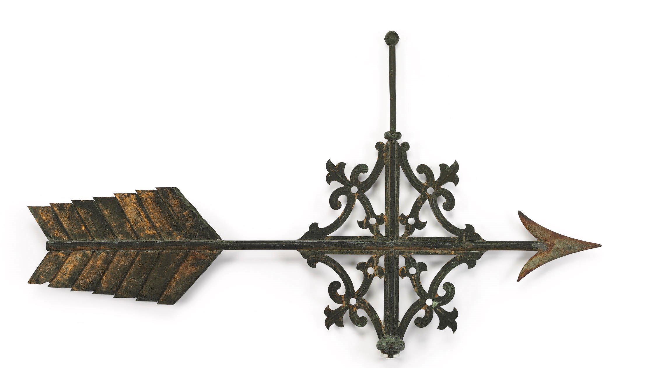 A PARCEL-GILT MOLDED COPPER AND ZINC SCROLL-WORK BANERETTE WEATHERVANE