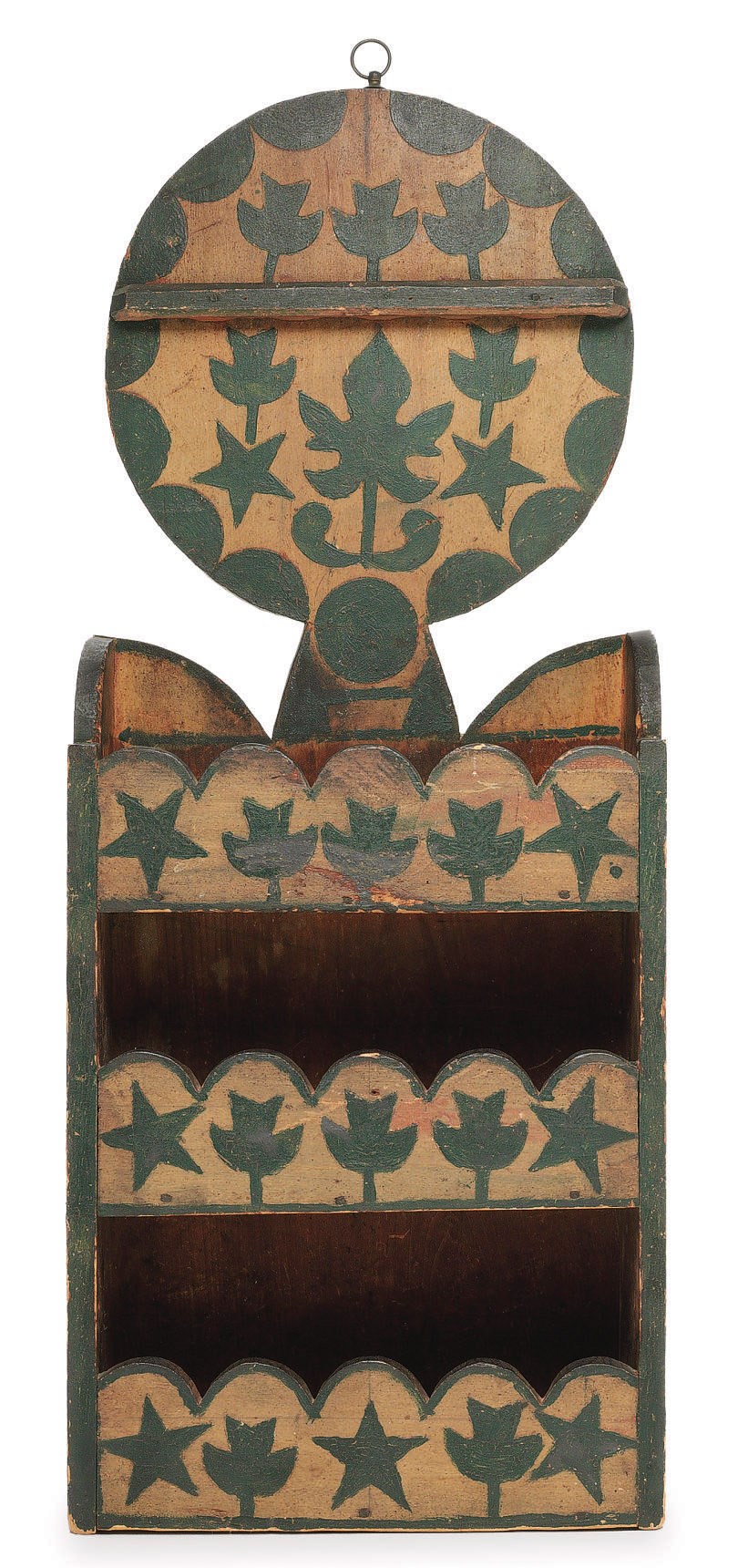 A PAINTED AND POLYCHROME DECORATED HANGING SPOON RACK
