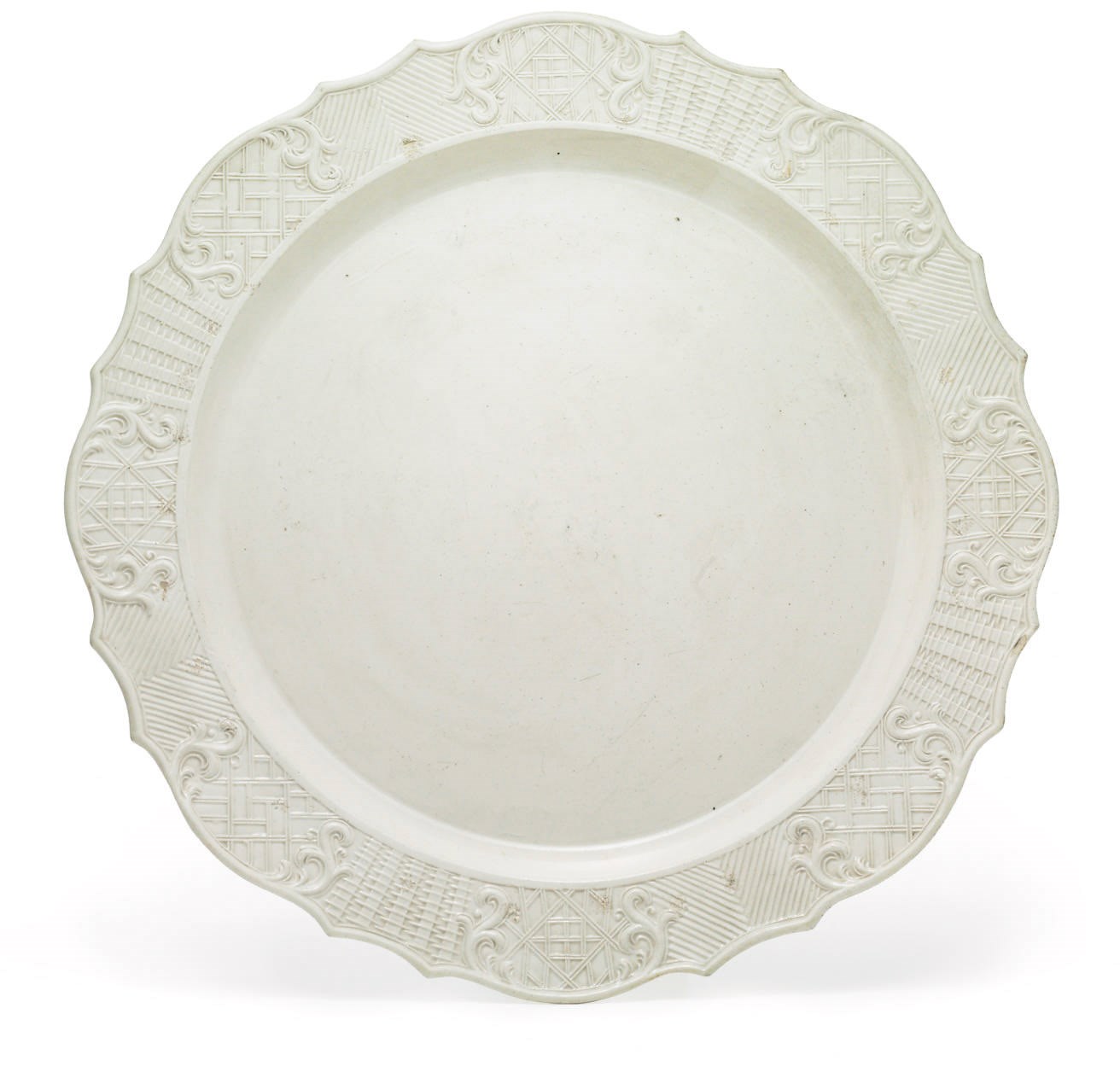 A STAFFORDSHIRE WHITE SALTGLAZE STONEWARE CHARGER