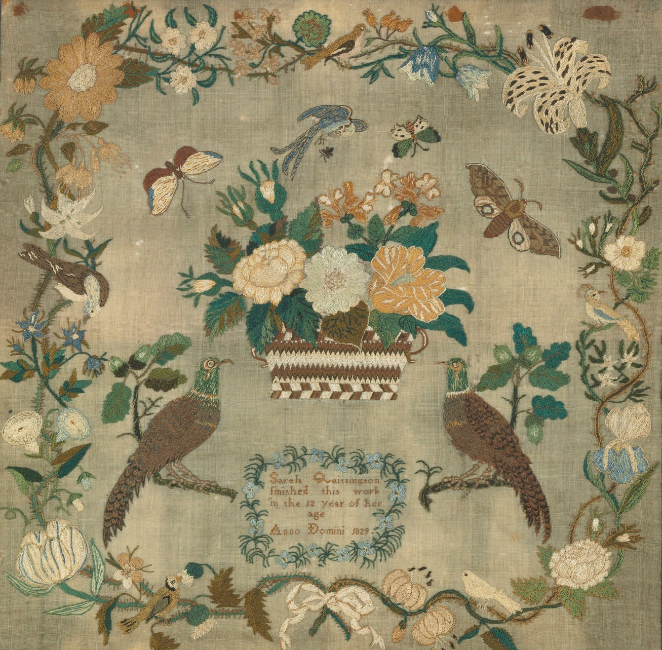 A SILK ON LINEN NEEDLEWORK SAMPLER