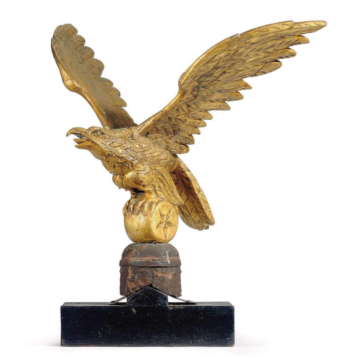 A CARVED GILTWOOD EAGLE FINIAL