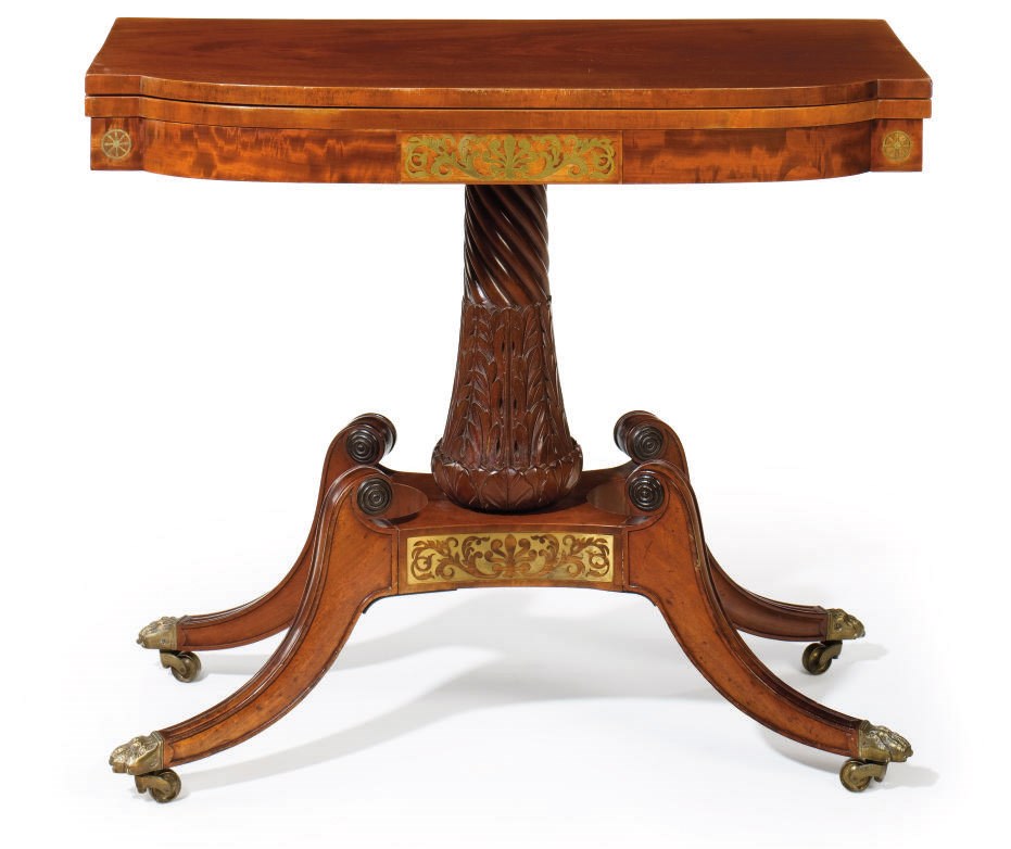 A CLASSICAL BRASS-INLAID CARVED MAHOGANY CARD TABLE