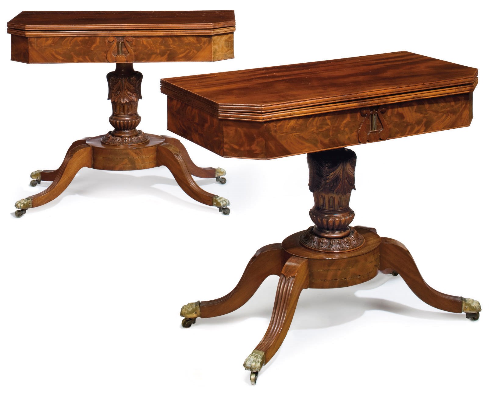 A PAIR OF EMPIRE CARVED AND FIGURED MAHOGANY CARD TABLES