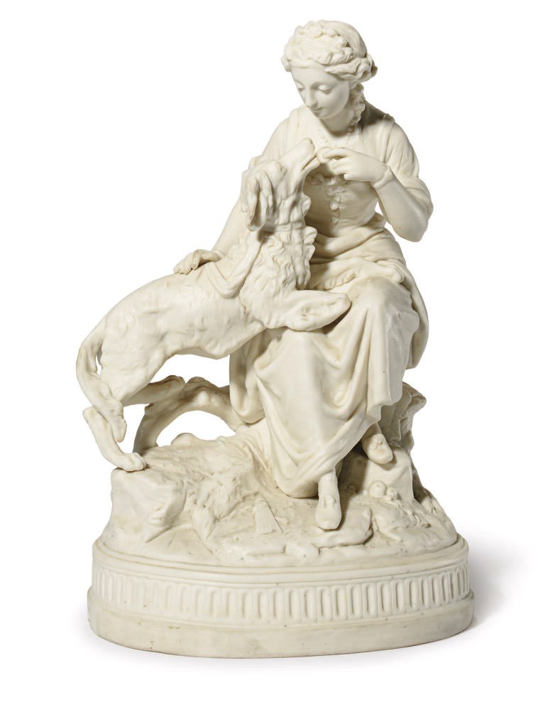 A PARIANWARE FIGURAL GROUP DEPICTING A WOMAN FEEDING A DOG