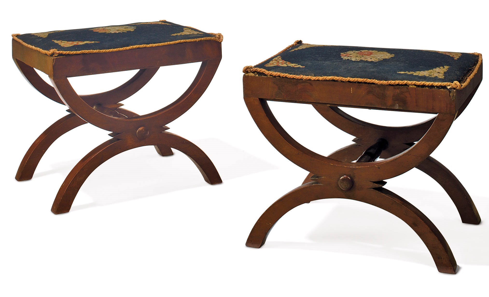 A PAIR OF CLASSICAL MAHOGANY CURULE-FORM STOOLS