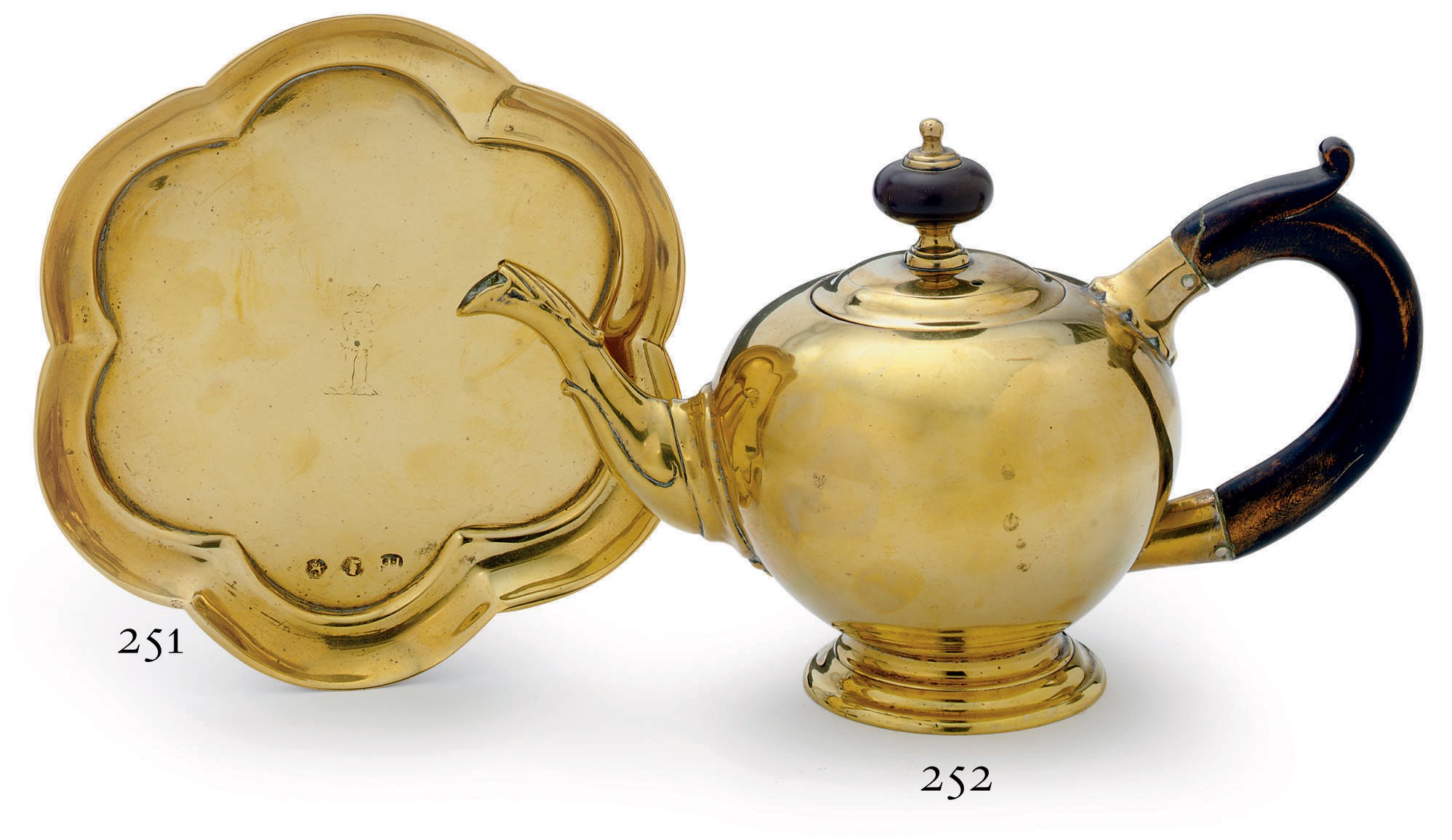 A GEORGE I SILVER-FORM BRASS AND WOOD TEAPOT