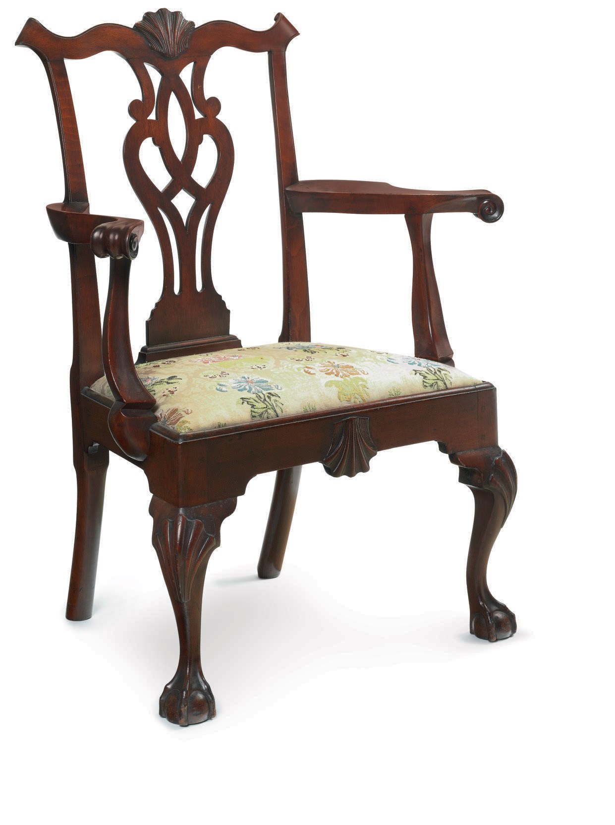 A CHIPPENDALE CARVED WALNUT OPEN ARMCHAIR