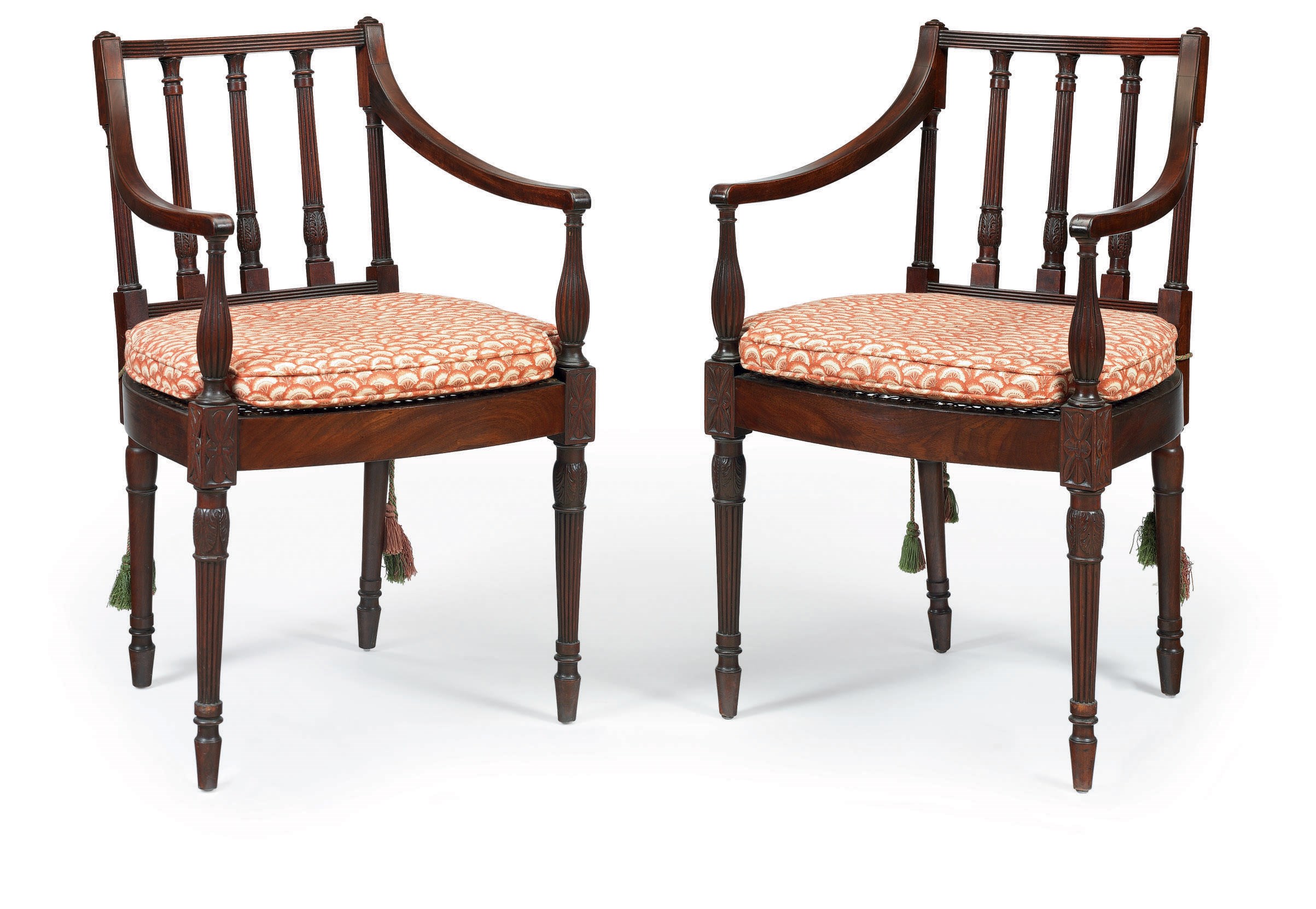 A PAIR OF FEDERAL CARVED MAHOGANY CANE-SEAT ARMCHAIRS