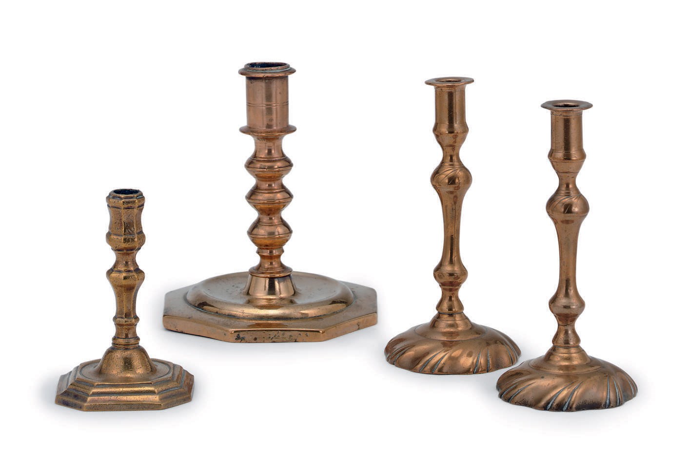 A PAIR OF GEORGE II BELL METAL TAPERSTICKS