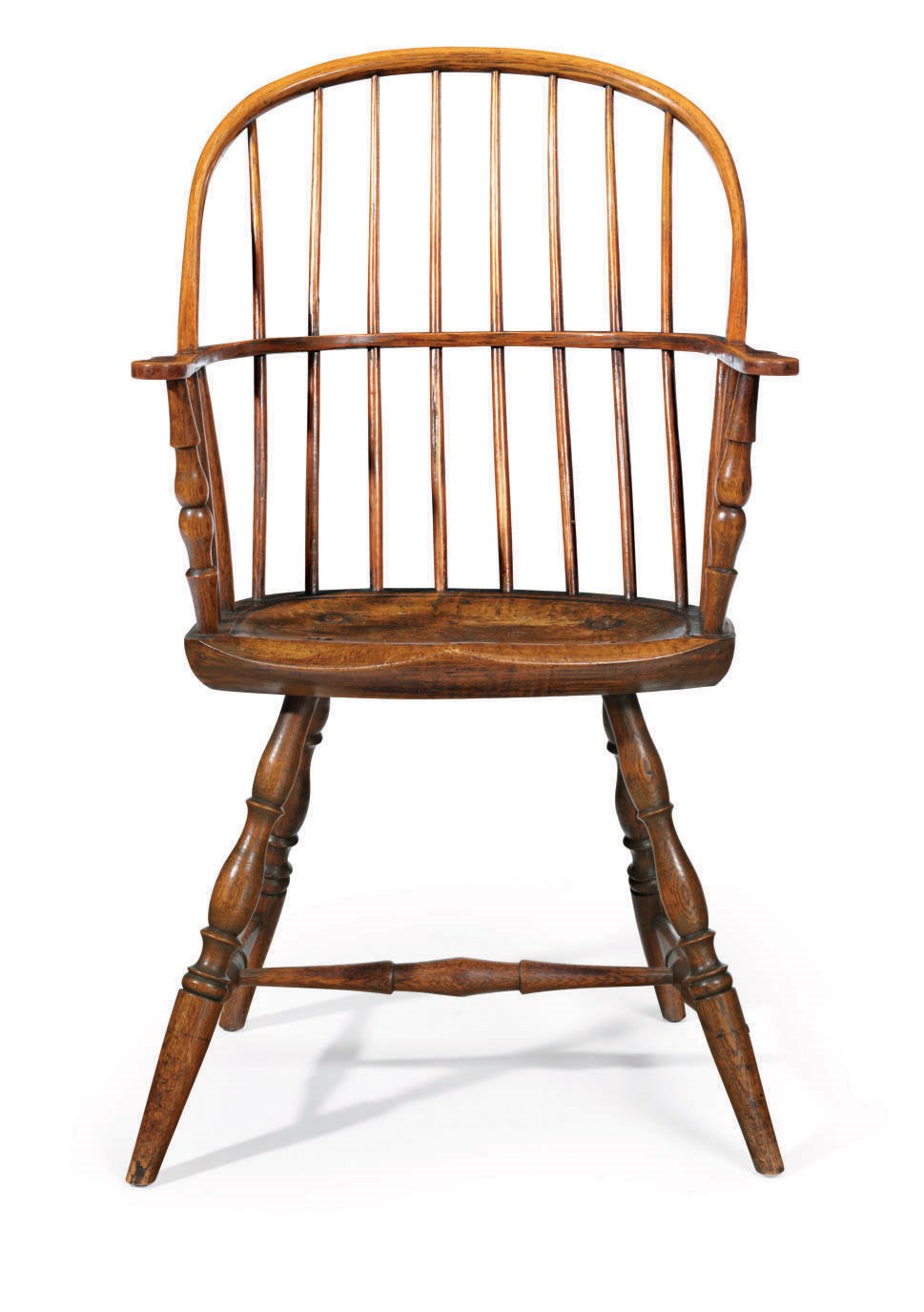 A SACK-BACK WINDSOR ARMCHAIR
