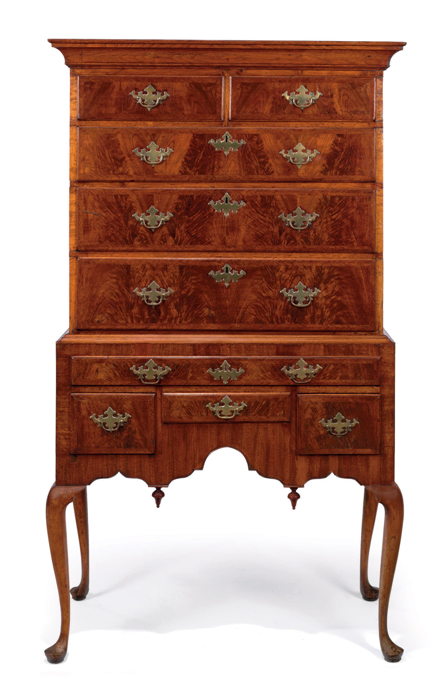 A QUEEN ANNE FIGURED WALNUT AND MAPLE FLAT-TOP HIGH CHEST-OF-DRAWERS