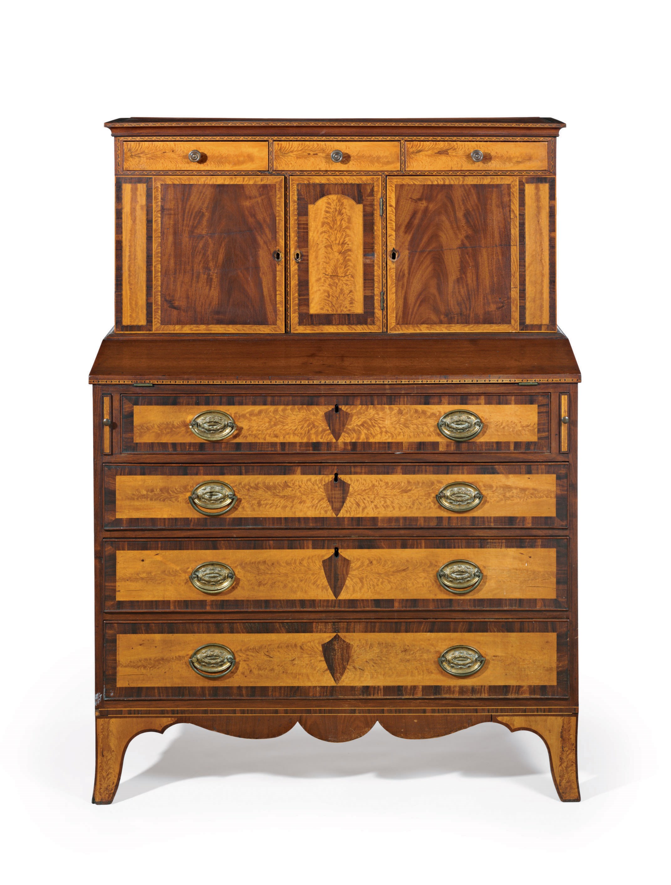 A FEDERAL FIGURED BIRCHWOOD-INLAID MAHOGANY LADY'S DESK-AND-BOOKCASE
