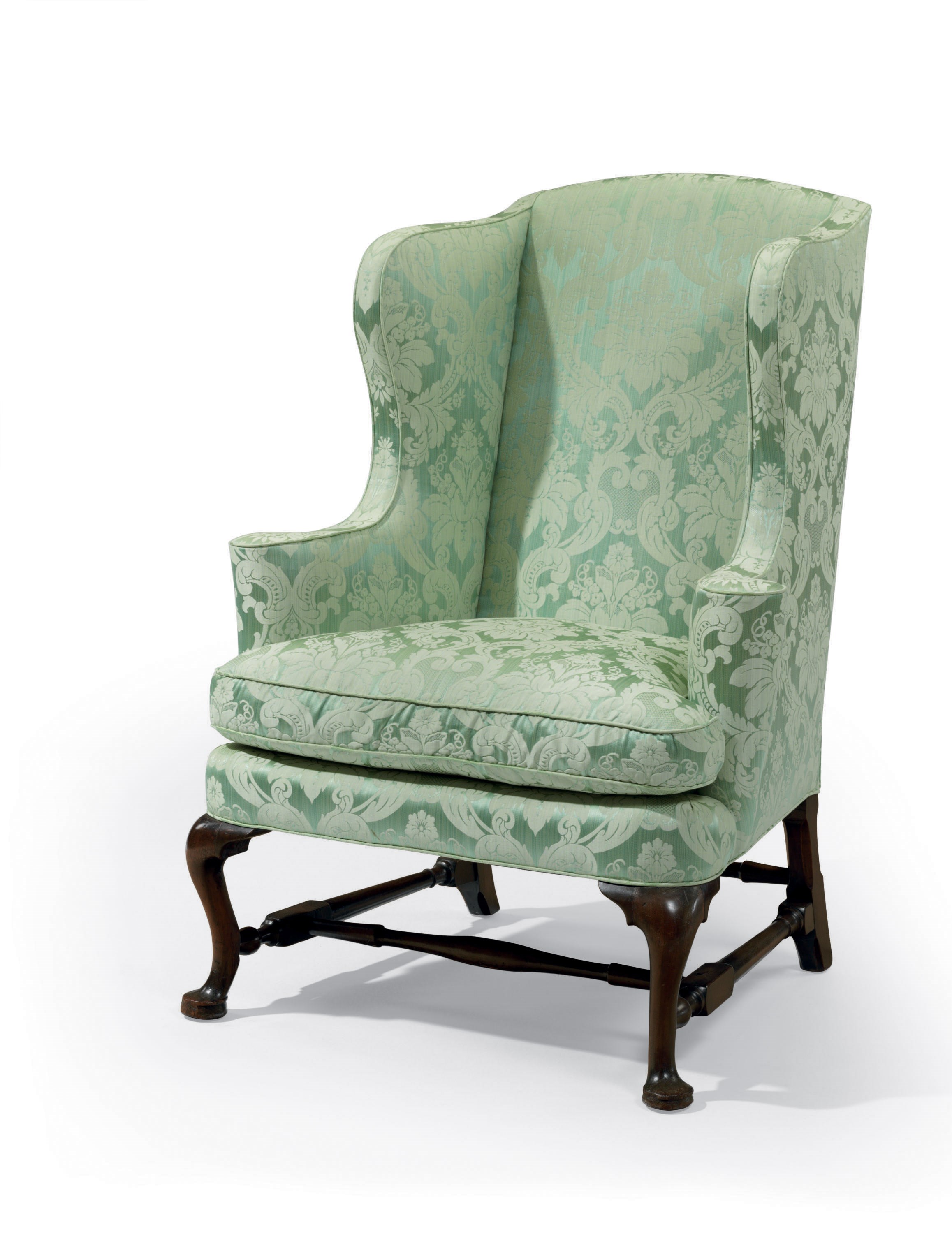 A QUEEN ANNE UPHOLSTERED EASY CHAIR