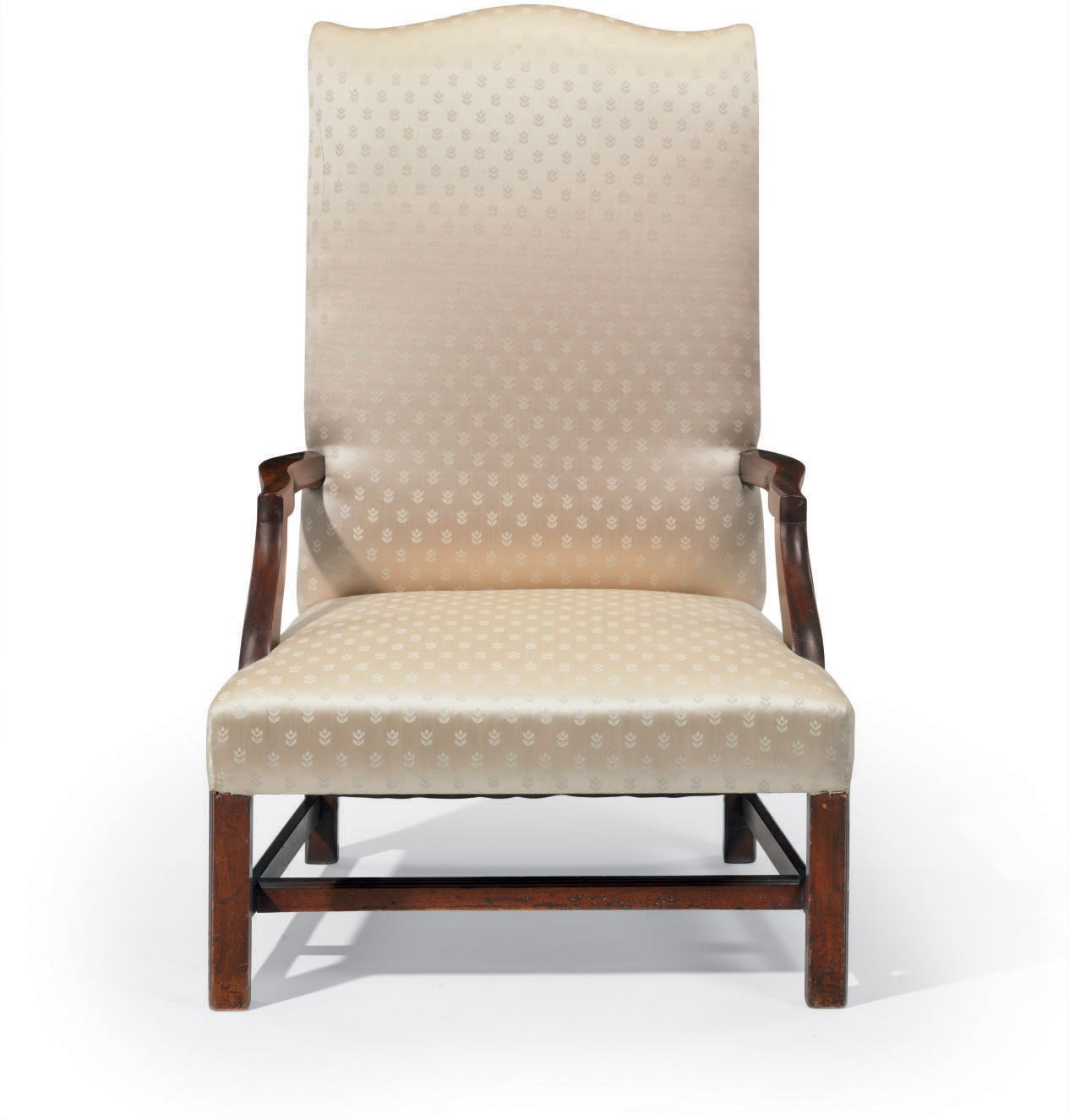 A CHIPPENDALE MAHOGANY LOLLING CHAIR