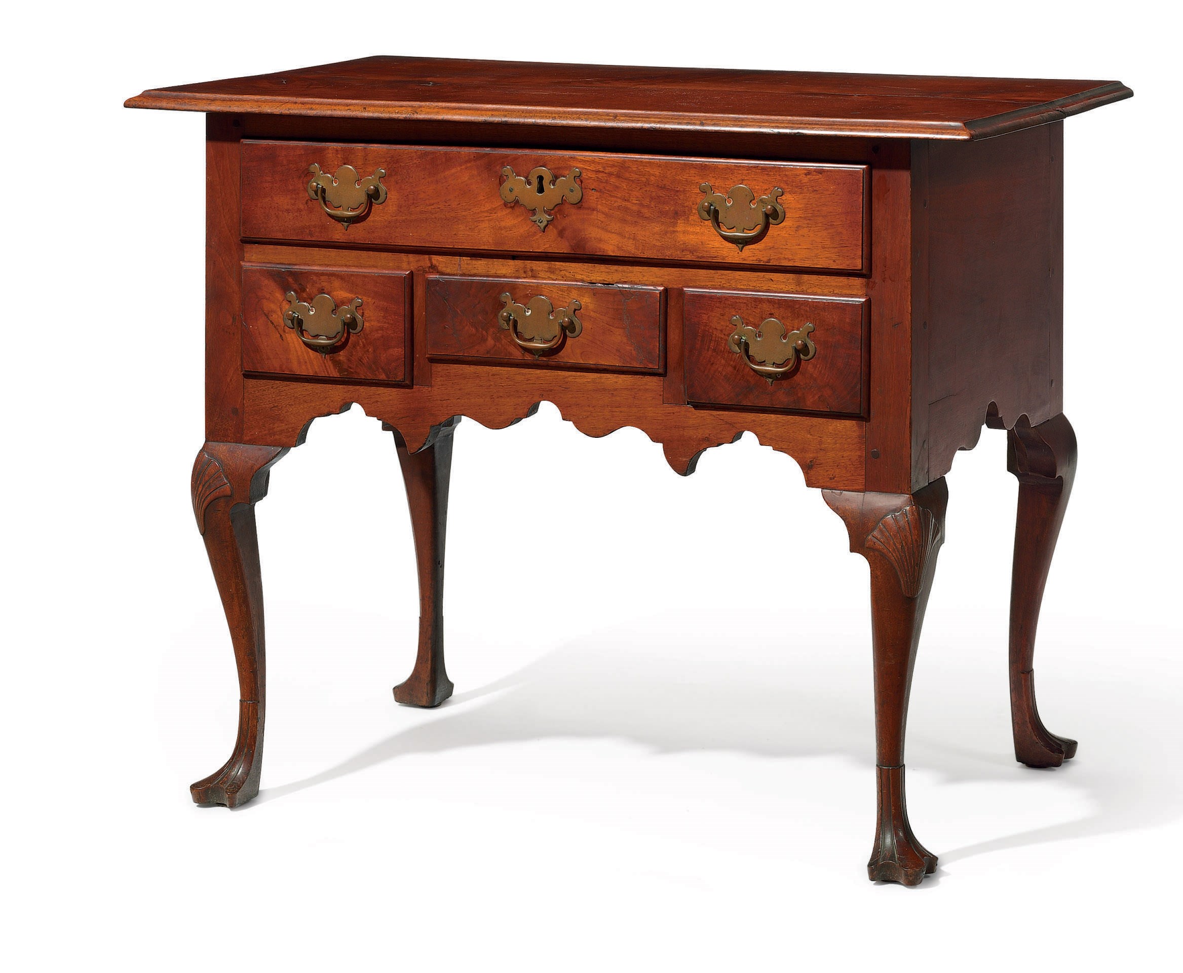 A QUEEN ANNE CARVED WALNUT DRESSING TABLE