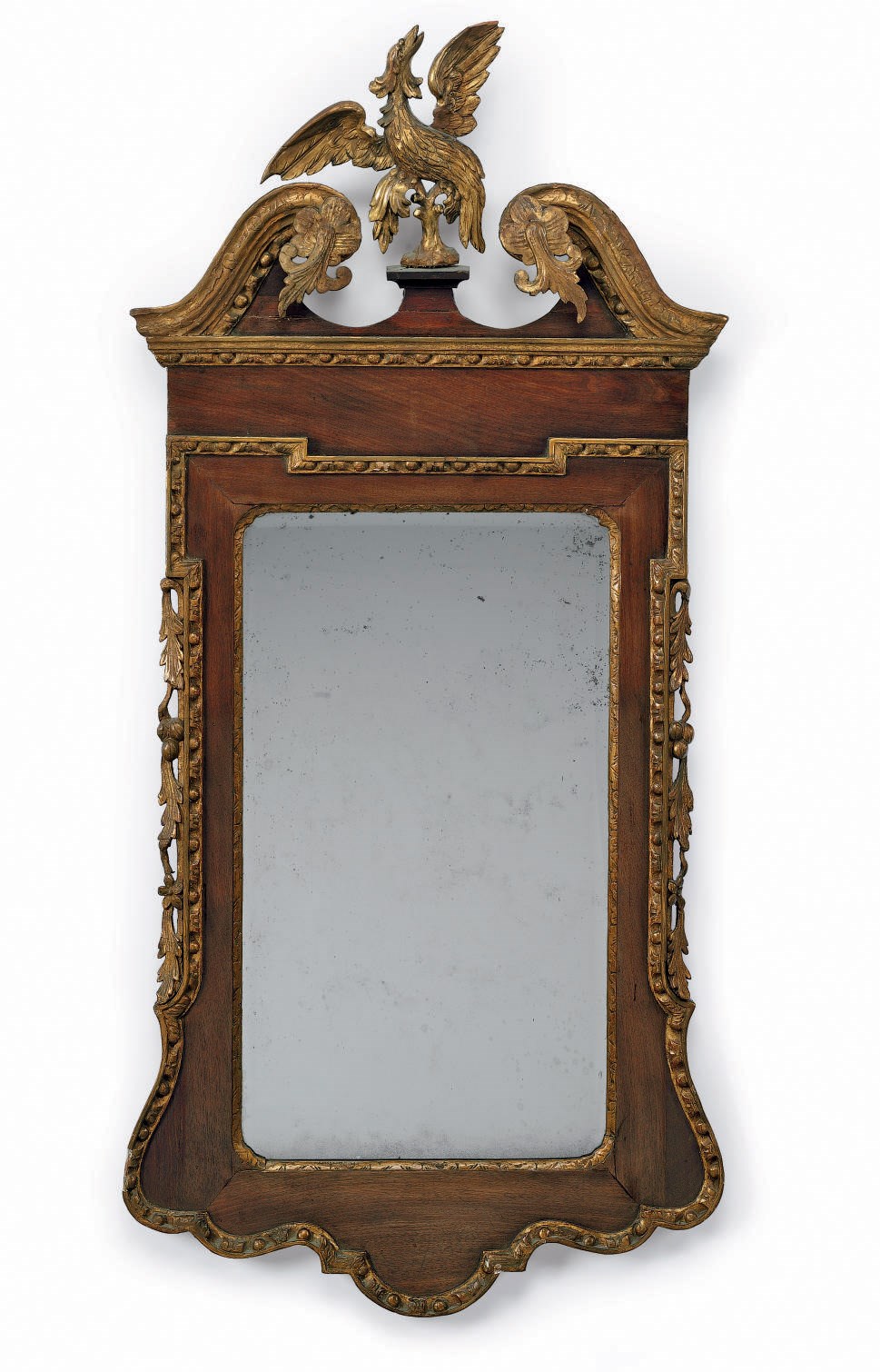 A CHIPPENDALE PARCEL-GILT WALNUT LOOKING GLASS