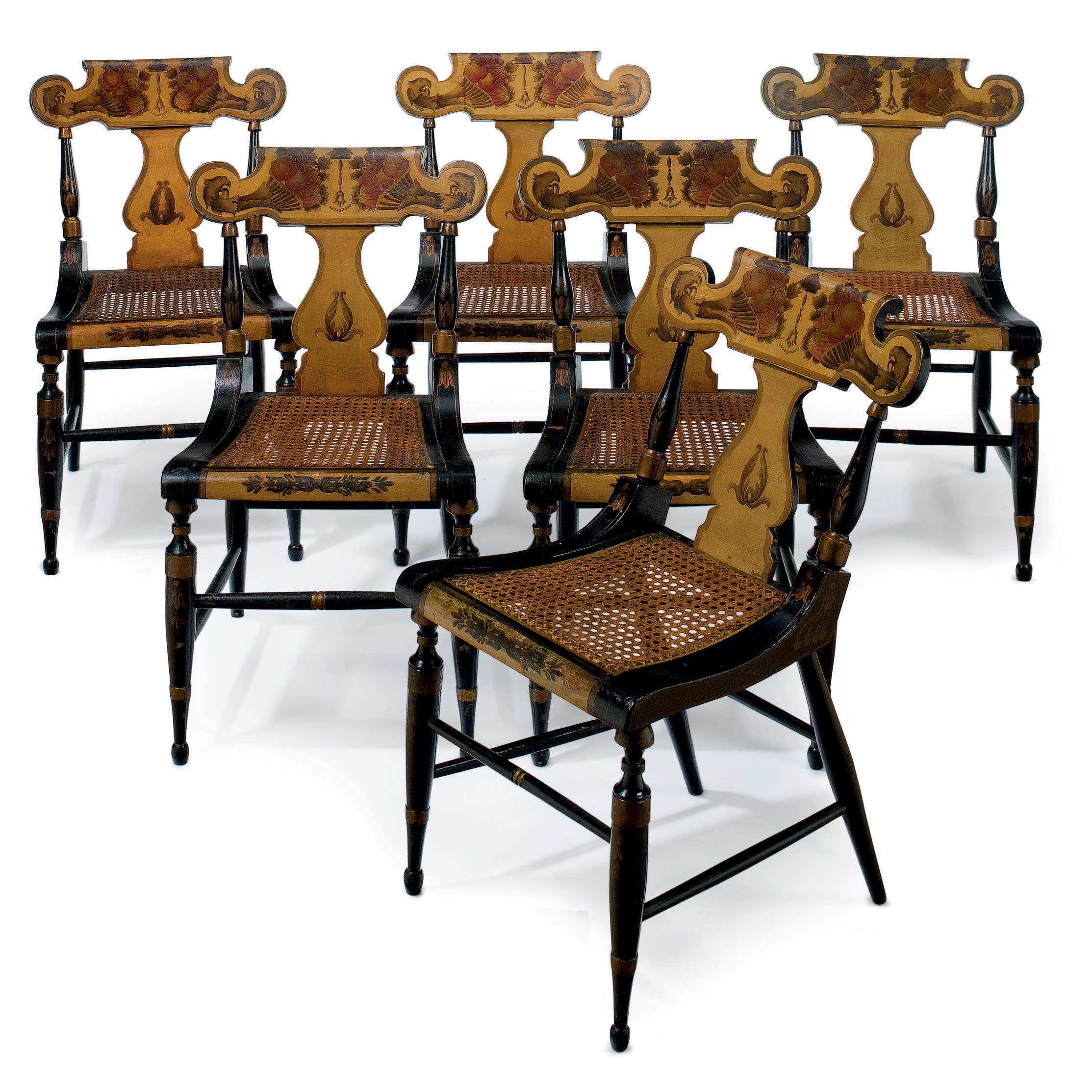 A SET OF SIX CLASSICAL BLACK, GOLD AND STENCIL DECORATED DINING CHAIRS