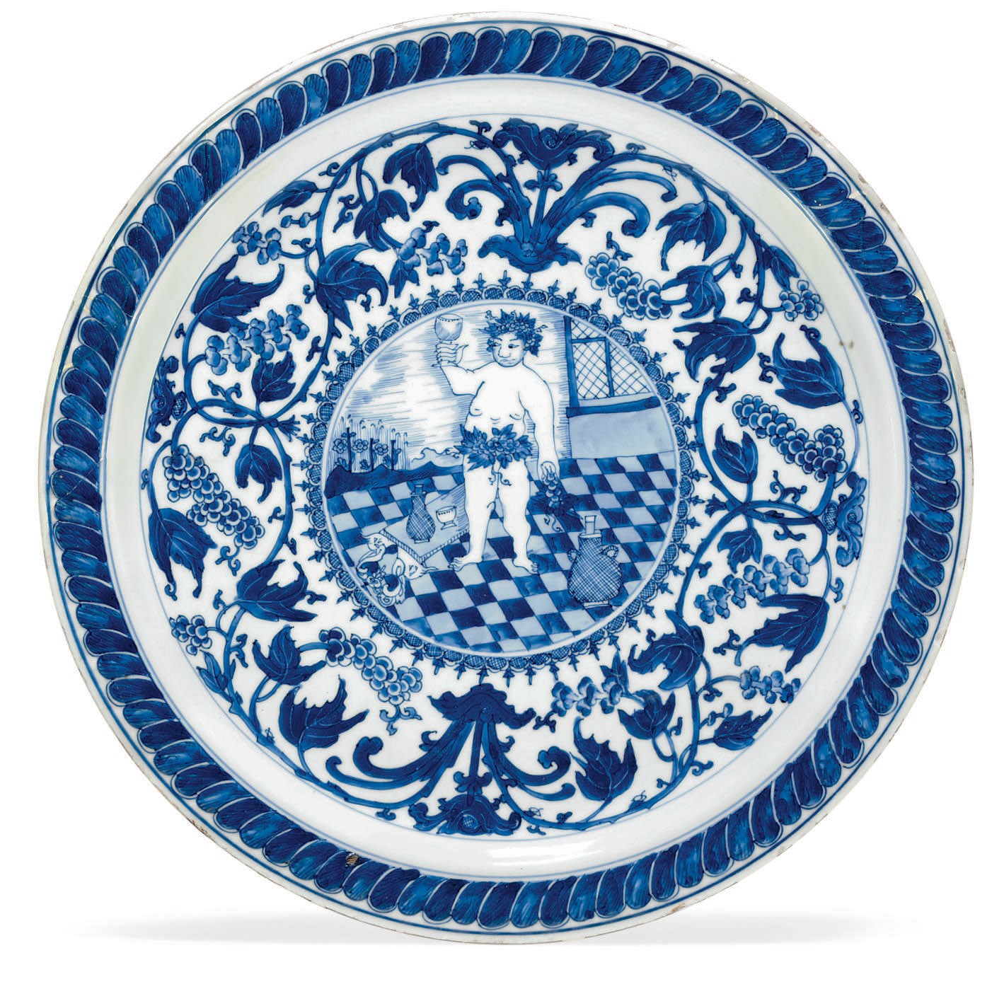 A LARGE BLUE AND WHITE "BACCHUS" DISH