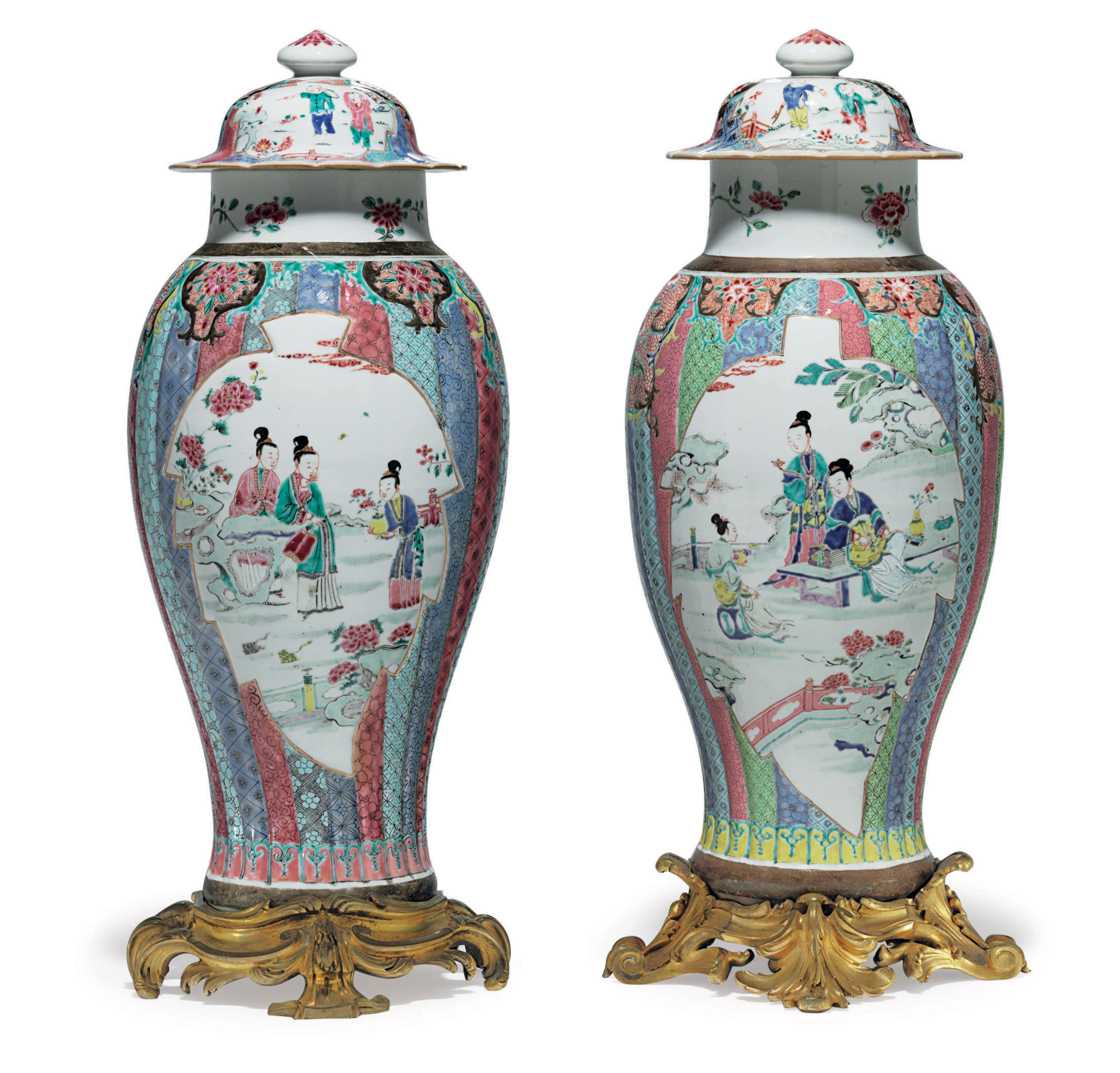 A LARGE PAIR OF FAMILLE ROSE BALUSTER VASES AND COVERS