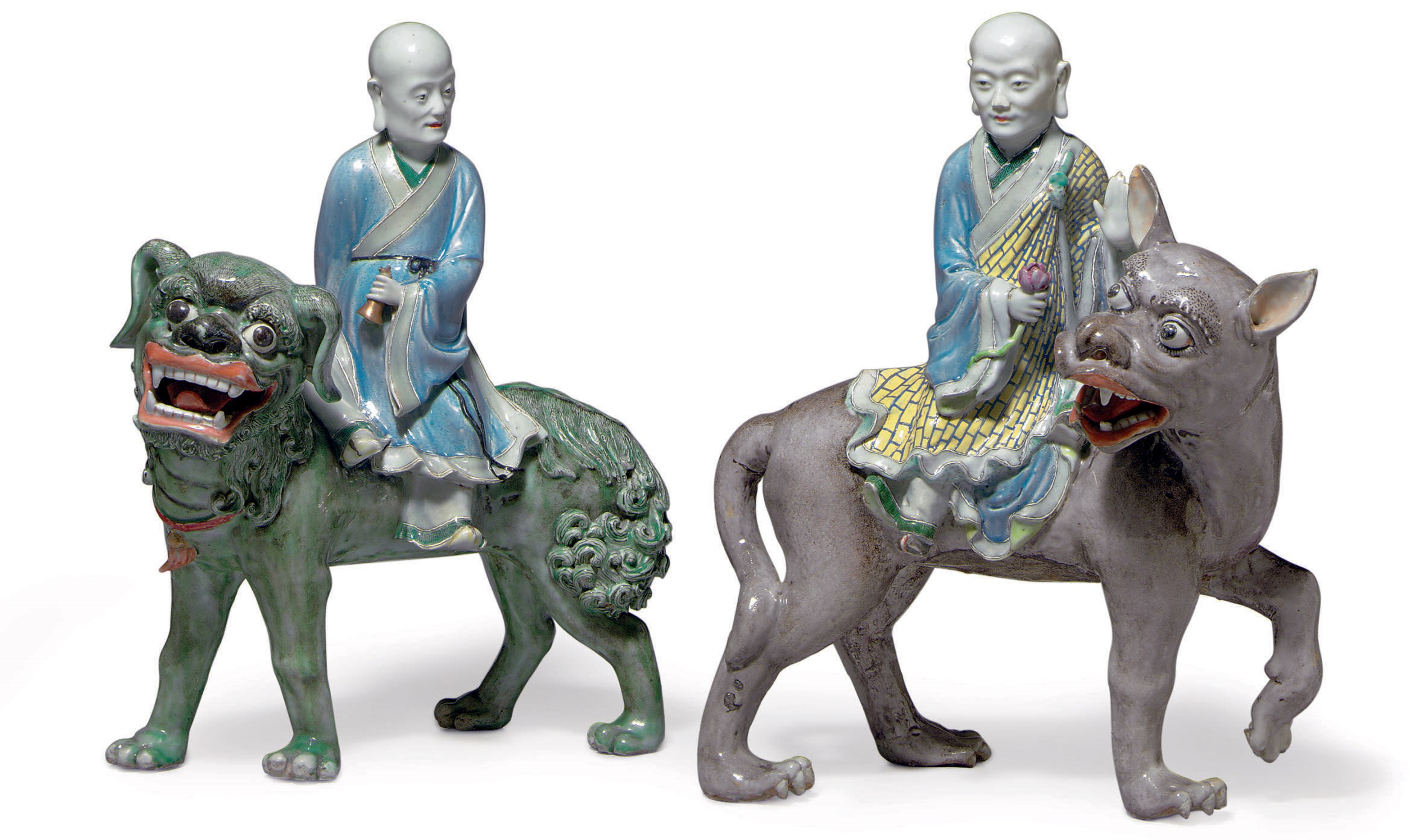 A PAIR OF FAMILLE ROSE FIGURES OF LUOHANS