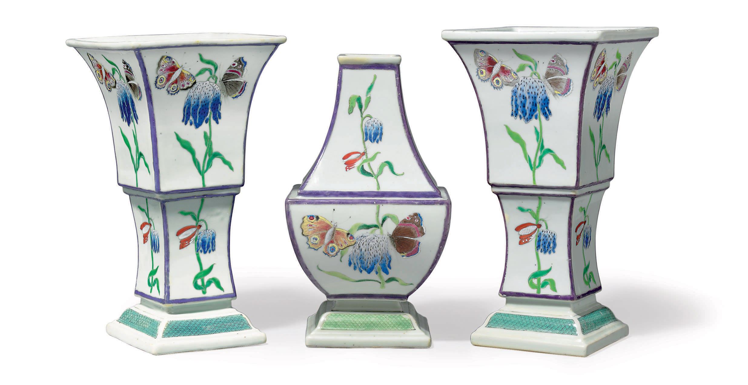 A RARE BOTANICAL THREE-PIECE GARNITURE