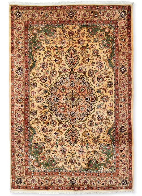 A fine part silk Tabriz carpet