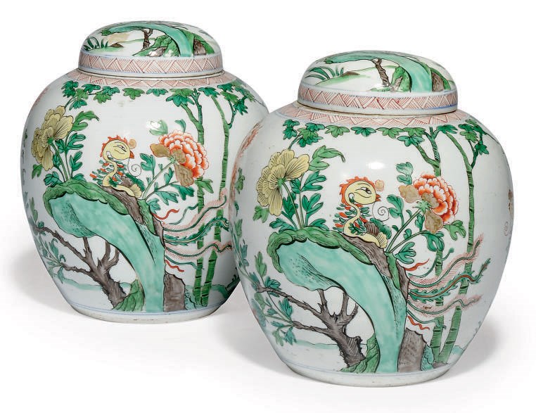 A PAIR OF CHINESE-STYLE FAMILLE VERTE JARS AND COVERS