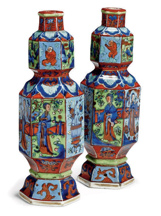 A PAIR OF CHINESE CLOBBERED BLUE AND WHITE HEXAGONAL VASES