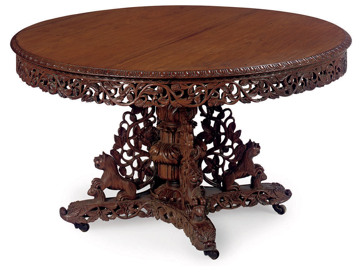 AN INDIAN ROSEWOOD BREAKFAST TABLE