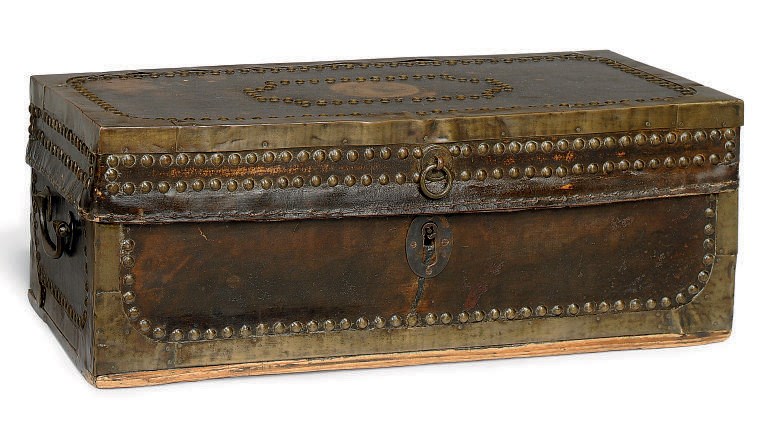 A CHINESE EXPORT LEATHER AND BRASS MOUNTED TRUNK