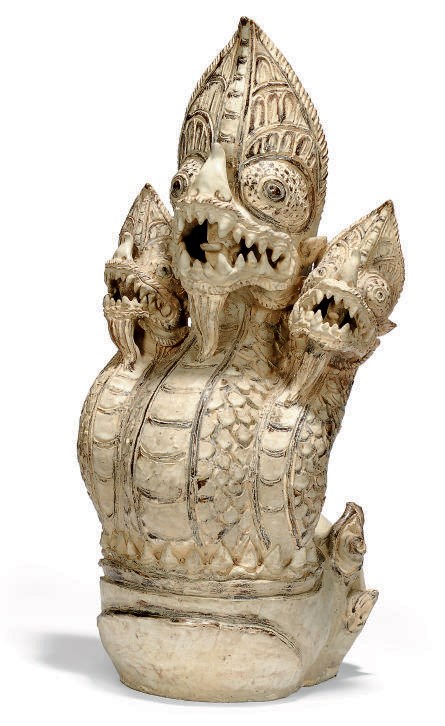 A SAWANKHALOK BROWN-AND-PEARL CERAMIC MODEL OF THREE NAGA