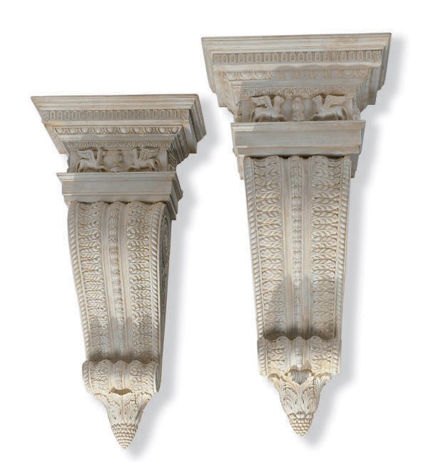 A PAIR OF CARVED AND PAINTED HARDWOOD CORBELS