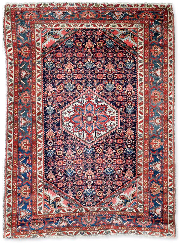 An antique Feraghan rug